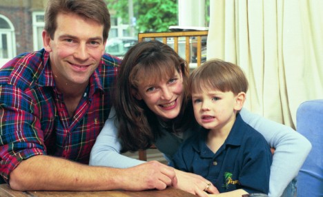 An old family photo of Jon and Polly Tommey with their son, Billy, who suffers from autism